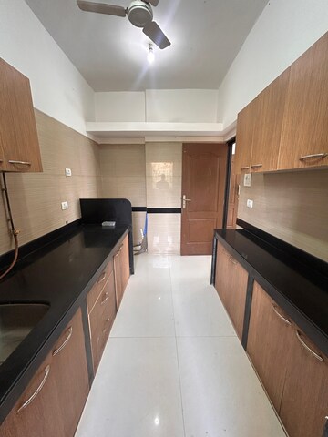 Kitchen in 3 BHK Apartment at K Raheja Heights, Malad East – for Sale