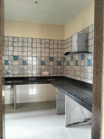 Kitchen in 2 BHK Apartment at Paradise Sai World City Phase 2, New Panvel – for Sale