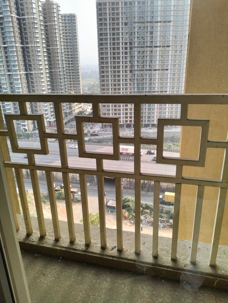 Balcony, paradise-sai-world-city-phase-2 2 Bedroom 701 Sq.Ft. Apartment In New Panvel Navi Mumbai 8014228