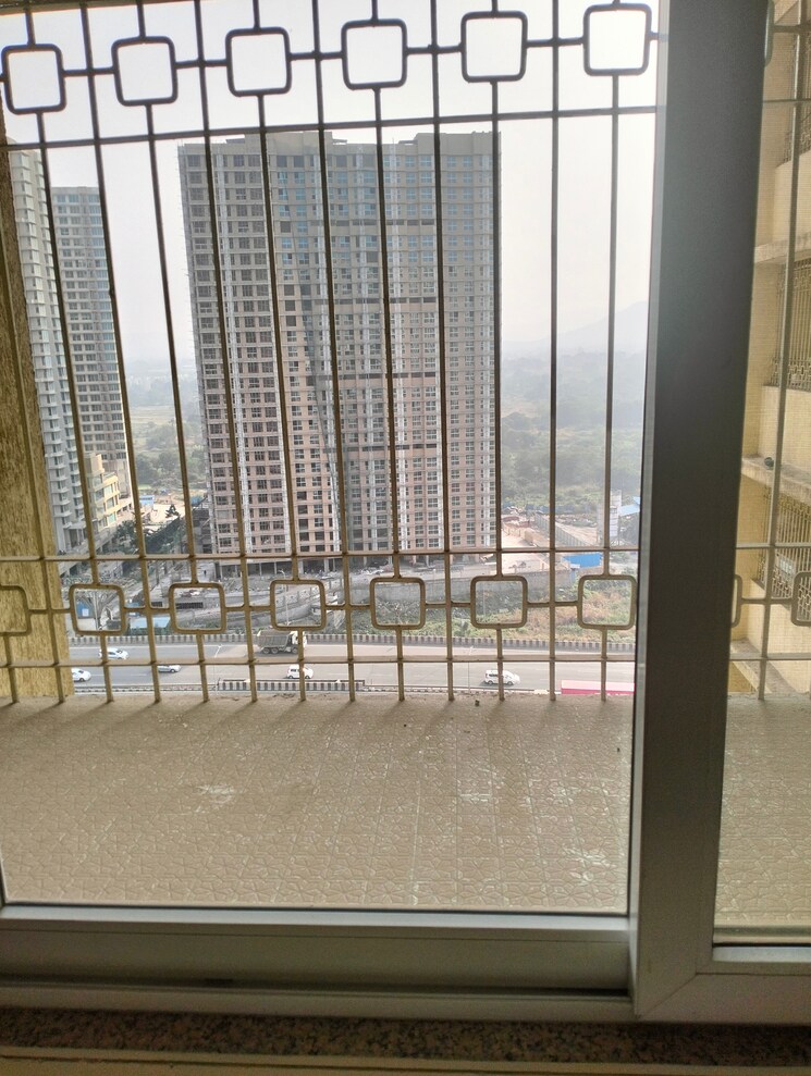 Balcony, paradise-sai-world-city-phase-2 2 Bedroom 701 Sq.Ft. Apartment In New Panvel Navi Mumbai 8014228