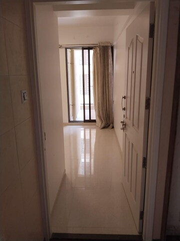 Building Lobby in 1 BHK Apartment at Arihant Anmol, Badlapur East – for Sale