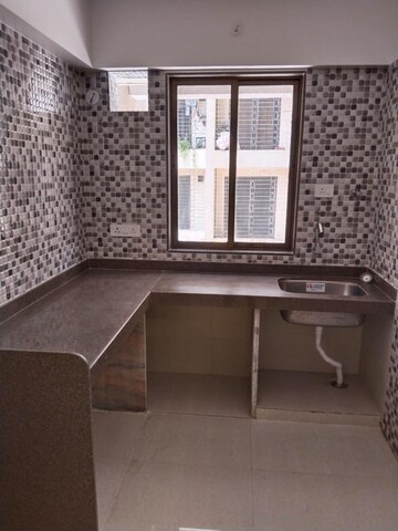 Kitchen in 1 BHK Apartment at Arihant Anmol, Badlapur East – for Sale