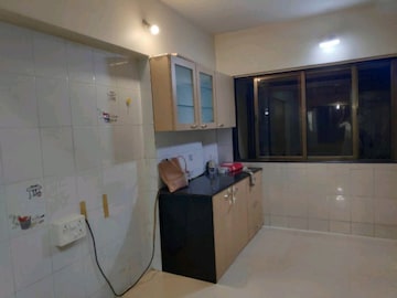 Kitchen in 2 BHK Apartment at Aniruddha CHS, Tilak Nagar – for Rent