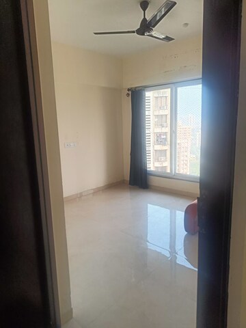 Room in 1 BHK Apartment at Ruparel Elara, Kandivali West – for Sale