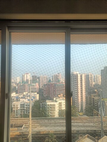 Master Bedroom in 1 BHK Apartment at Ruparel Elara, Kandivali West – for Rent