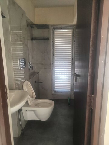 Bathroom in 1 BHK Apartment at Ruparel Elara, Kandivali West – for Rent