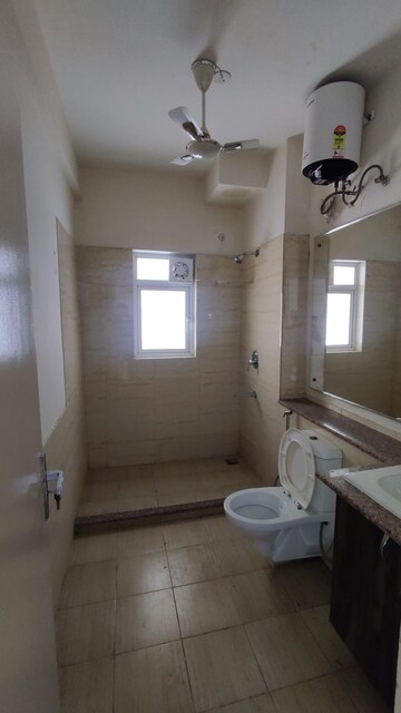 Bathroom in 3 BHK Apartment at Moti Nagar – for Rent