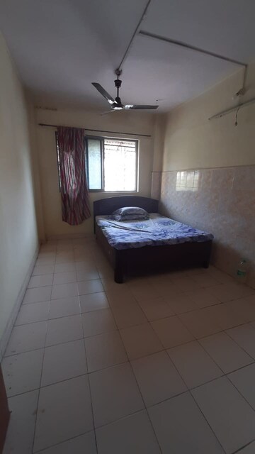 Bedroom in 1 BHK Apartment at Nilgiri Lokdhara CHS, Kalyan East – for Rent