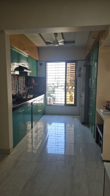 Kitchen in 2 BHK Apartment at Badshah Residency, Kandivali West – for Rent
