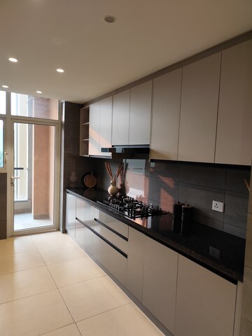 Kitchen in 4 BHK Builder Floor at Adani Samsara Vilasa, Sector 63 – for Sale