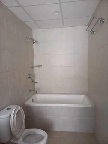 Bathroom in 3 BHK Apartment at Bhartiya Nikoo Homes, Thanisandra Main Road – for Rent