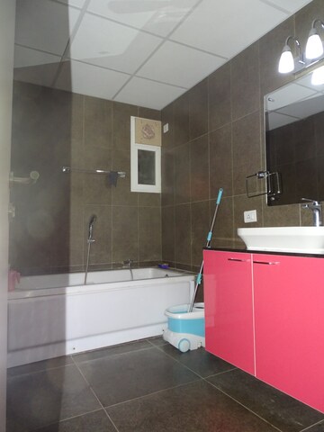 Bathroom in 4 BHK Apartment at Budigere Cross – for Sale