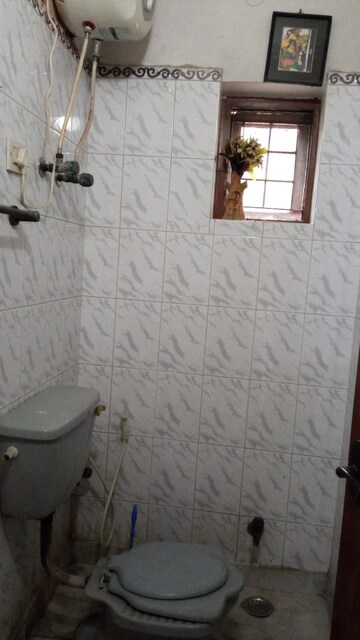 Bathroom in 3 BHK Apartment at Prateek Wisteria, Sector 77 – for Sale