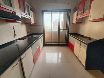 Kitchen in 2 BHK Apartment at Akshar Shreeji Heights, Seawoods – for Sale