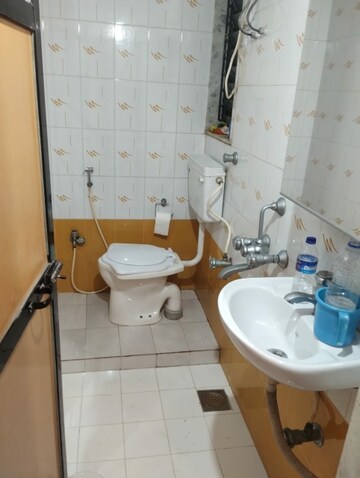 Bathroom in 2 BHK Apartment at Raj Heritage, Borivali West – for Rent