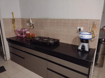 Kitchen in 2 BHK Apartment at Godrej Garden City, Jagatpur – for Rent