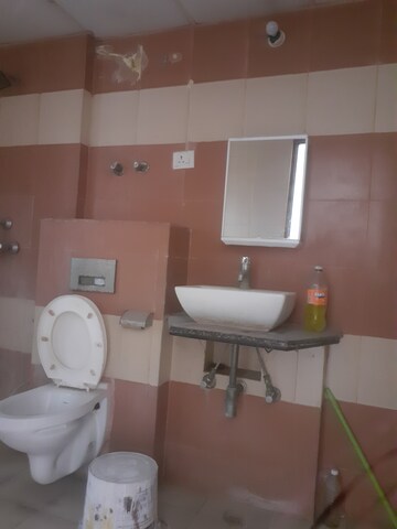 Bathroom in 3 BHK Apartment at Sector 16 Yamuna Expressway – for Rent