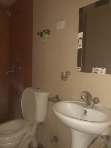 Bathroom in 3 BHK Apartment at Sector 16 Yamuna Expressway – for Rent