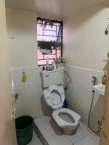 Bathroom in 1 BHK Apartment at Amba Vatika, Nibm – for Sale