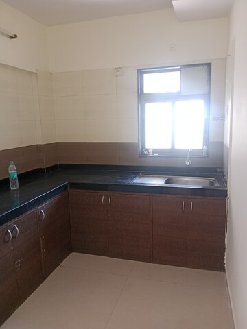 Kitchen in 2 BHK Apartment at Dosti Vihar, Samata Nagar – for Sale