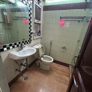 Bathroom in 3 BHK Builder Floor at South Extension I – for Sale