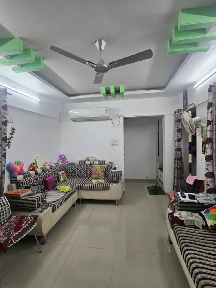 Living Room, ira-apartment-bhusari-colony 2 Bedroom 830 Sq.Ft. Apartment In Kothrud Pune 8016048