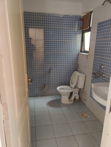 Bathroom in 2 BHK Apartment at Krish Aura, Alwar Bypass Road – for Rent