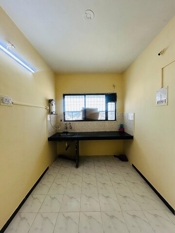 Kitchen in 1 BHK Apartment at Sunshree C2, Nibm – for Sale
