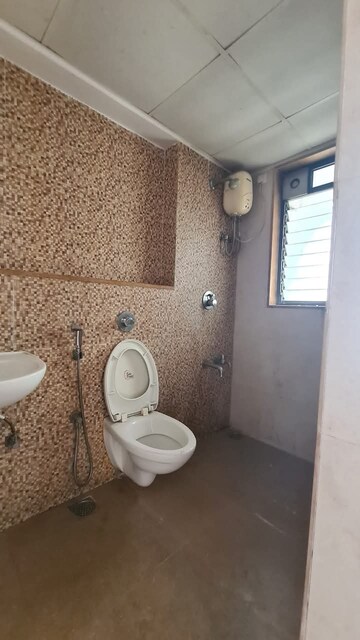 Bathroom in 1.5 BHK Apartment at Lodha Palava City Lakeshore Greens, Dombivli East – for Rent