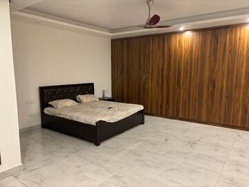 Bedroom in 4 BHK Builder Floor at Paryavaran Complex – for Rent