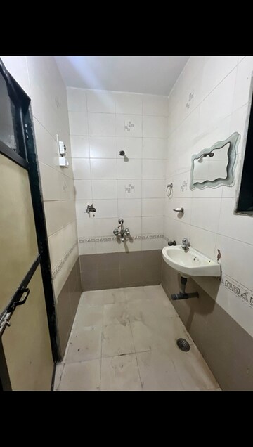 Bathroom in 2 BHK Apartment at Punyodaya Park, Kalyan West – for Rent