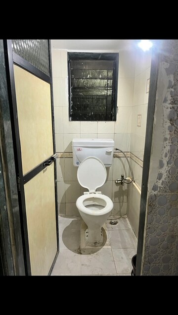 Bathroom in 2 BHK Apartment at Punyodaya Park, Kalyan West – for Rent