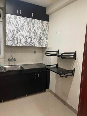 Kitchen in 3 BHK Apartment at Ramprastha City The Atrium, Sector 37d – for Rent