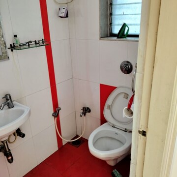 Bathroom in 2 BHK Apartment at Ratnakar CHS, Bhudargarh Colony – for Rent