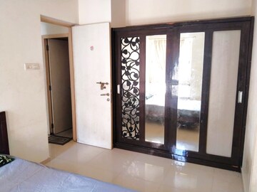 Bedroom in 2 BHK Apartment at Joshi Automatic CHS, Panch Pakhadi – for Rent