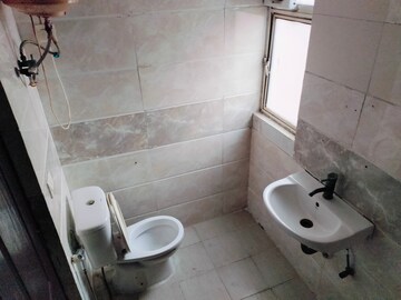 Bathroom in 2 BHK Apartment at Amrapali Princely Estate, Sector 76 – for Rent