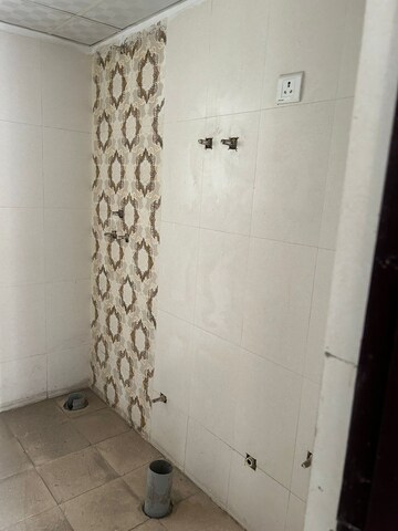 Bathroom in 2 BHK Apartment at AFOWO Raksha Addela, Sector 16c Greater Noida – for Rent