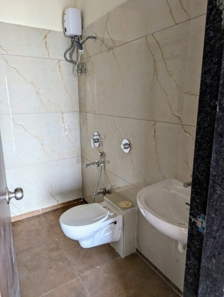 Bathroom, raunak-city-phase-2 1 Bedroom 609 Sq.Ft. Apartment In Kalyan West Thane 8016797
