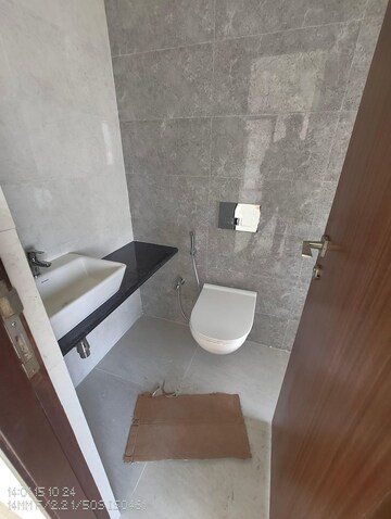 Bathroom in 1 BHK Apartment at Omkar Signet, Malad East – for Rent