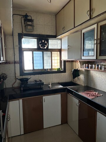 Kitchen in 4 BHK Apartment at Sai Vihar CHS Belapur, Cbd Belapur Sector 15 – for Rent