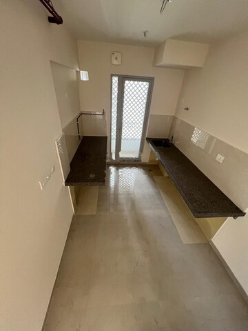 Kitchen in 2 BHK Apartment at Piramal Vaikunth, Balkum Pada – for Rent