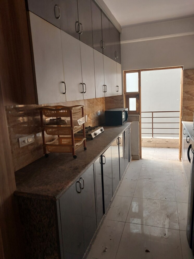 Kitchen, quantum-colonisers-quantum-residency 4 Bedroom 1782 Sq.Ft. Apartment In Raj Nagar Extension Ghaziabad 8017021