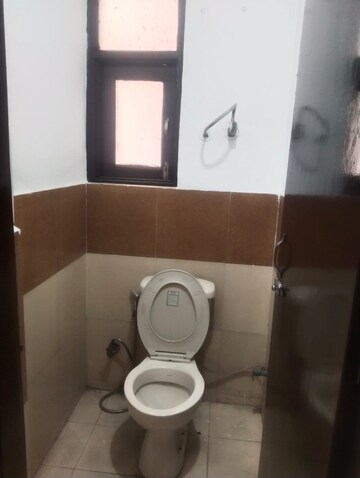 Bathroom in 2 BHK Apartment at Nilaya Greens, Raj Nagar Extension – for Rent