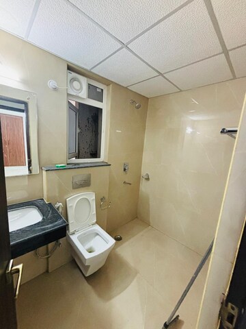 Bathroom in 3 BHK Apartment at Rishita Manhattan, Gomti Nagar – for Rent