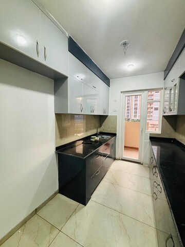 Kitchen in 3 BHK Apartment at Rishita Manhattan, Gomti Nagar – for Rent