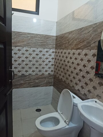 Bathroom in 3 BHK Builder Floor at Guru Nanak Enclave, Dhakoli Village – for Sale
