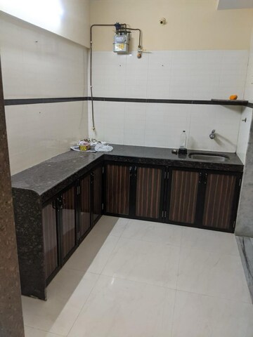 Kitchen in 2 BHK Apartment at Concrete Sai Swar, Kharghar – for Rent