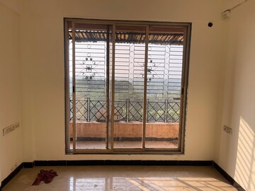 Room in 2 BHK Apartment at Mahavir CHS Nerul, Nerul – for Sale