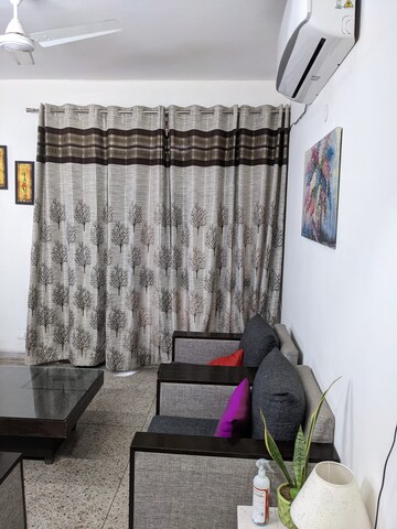 Living Room in 2 BHK Apartment at Dhoot Time Residency, Sector 63 – for Rent