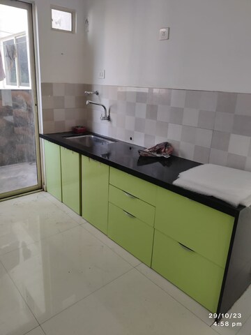 Kitchen in 3 BHK Apartment at Shivam 19 Grand West, Thergaon – for Sale